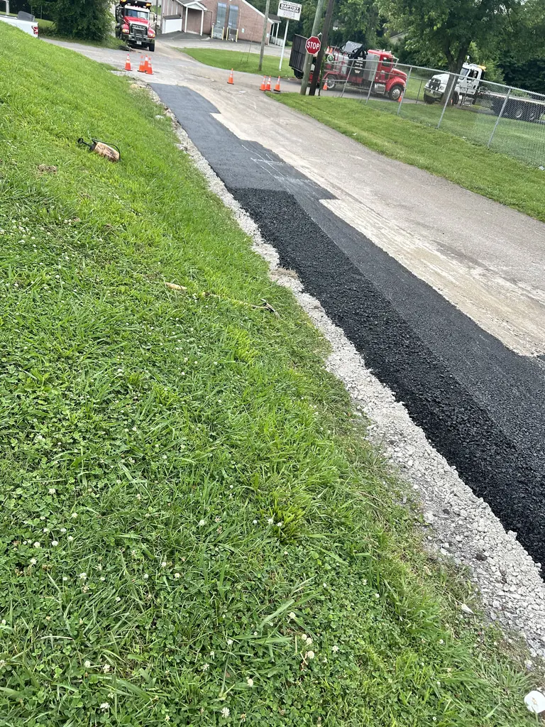 New asphalt apron laid along the road edge in Knoxville, Tennessee