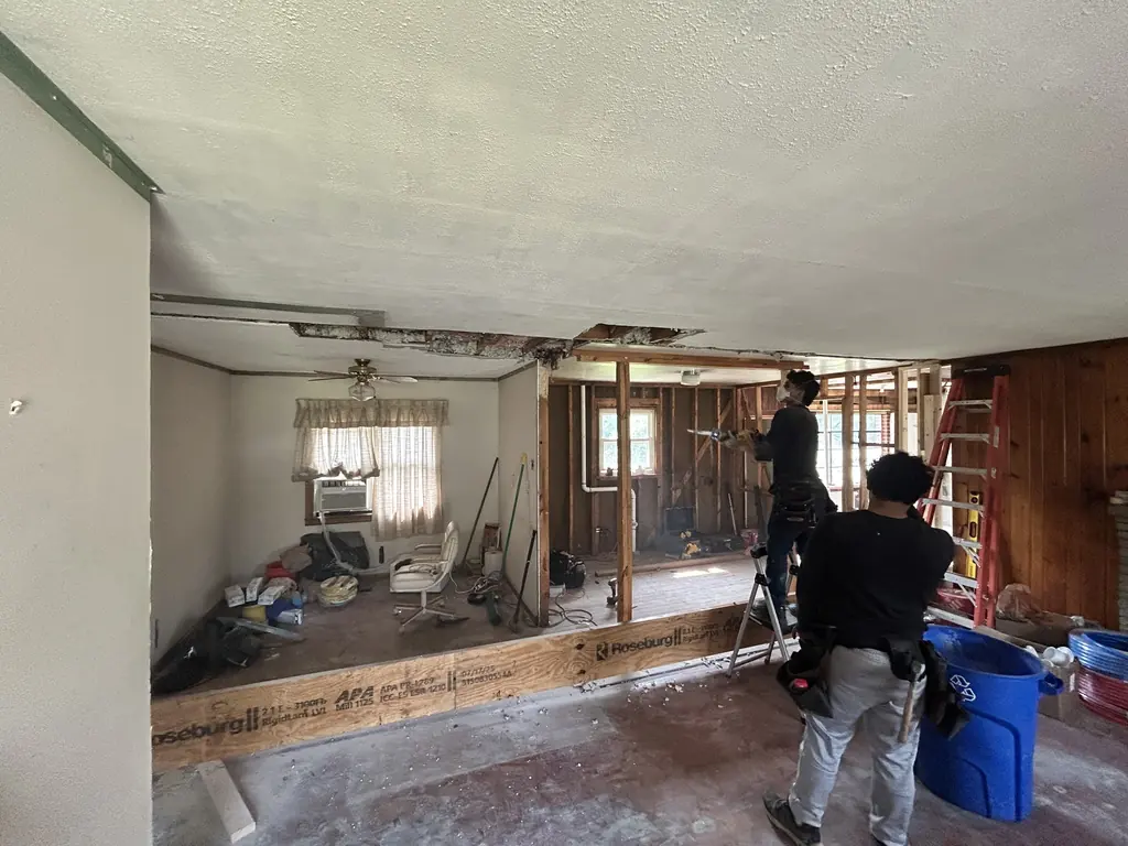 Crew opening up an interior wall in Knoxville, Tennessee