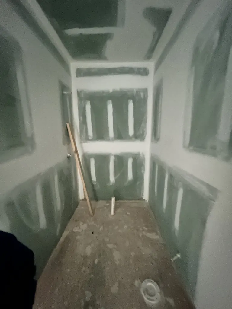 Drywall hung and taped in a hallway in Knoxville, Tennessee