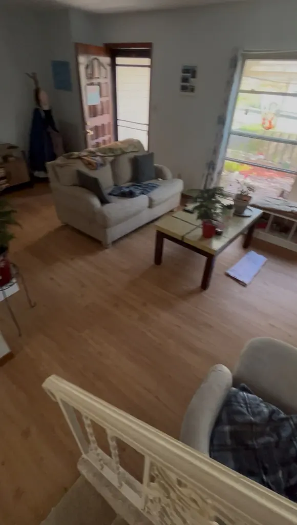 Living room with new hardwood flooring after the carpet came out, Knoxville, TN