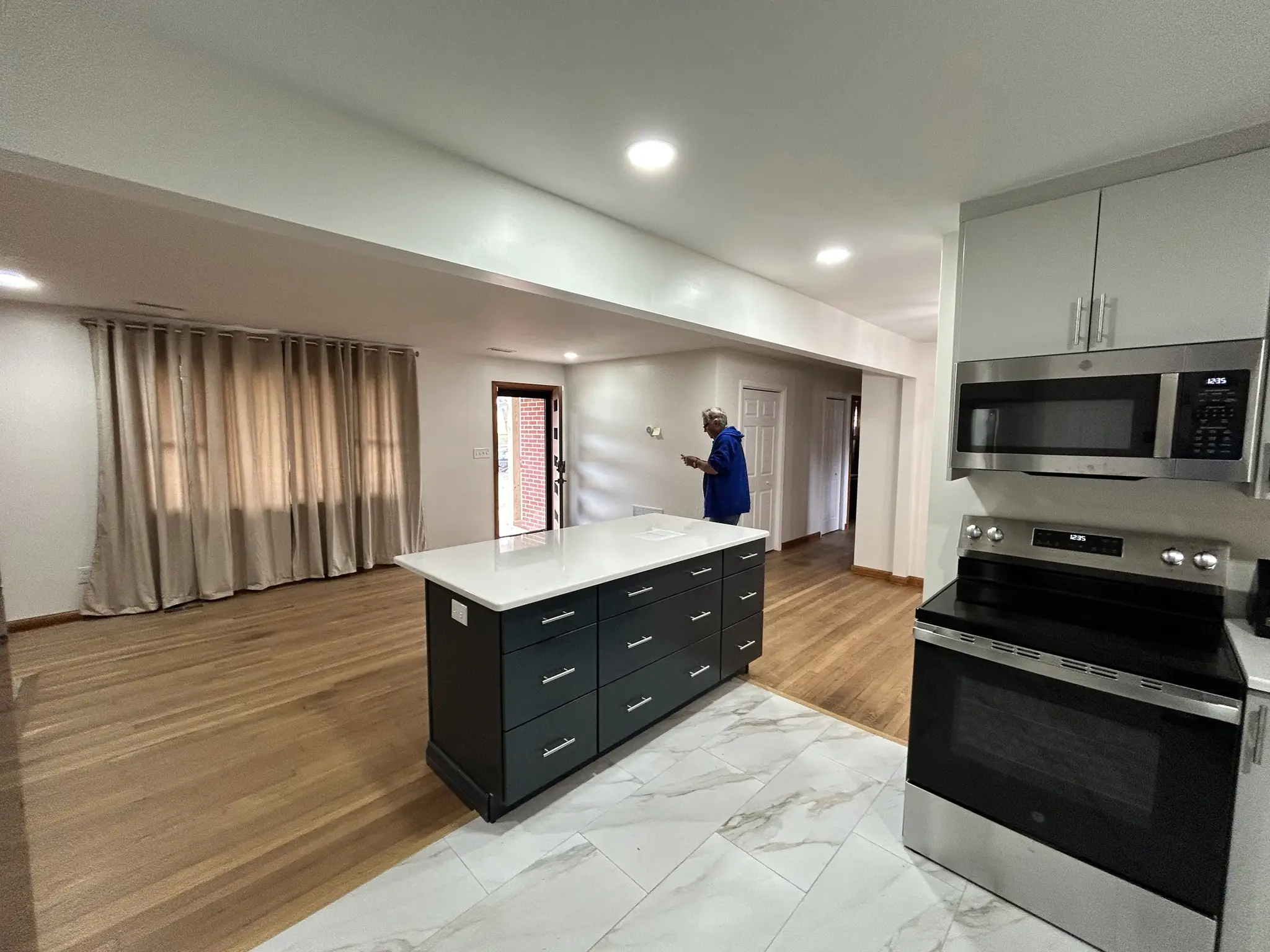Finished kitchen with a new island and tile floor in Knoxville, Tennessee