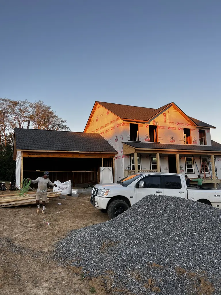 Sheathed new home with an attached garage in Knoxville, Tennessee