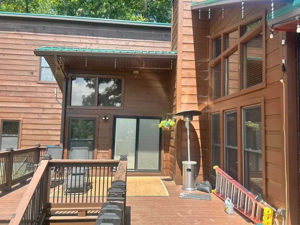 Covered deck built onto a cedar-sided home in Knoxville, Tennessee