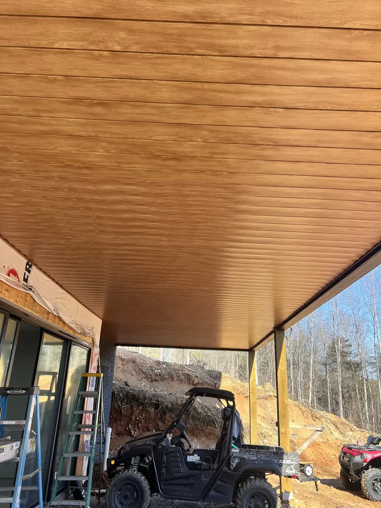 Covered parking structure with a finished wood ceiling in Knoxville, Tennessee
