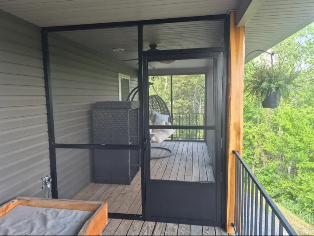 Screened porch built off the back deck of a home in Knoxville, Tennessee