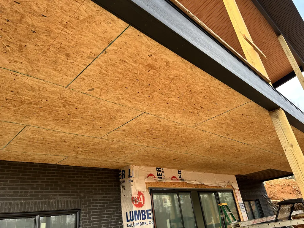 Tongue-and-groove ceiling being installed on a patio cover in Knoxville, Tennessee