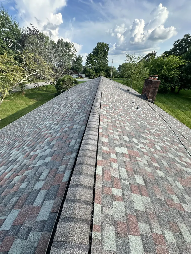 Finished architectural shingle roof with a clean ridge line in Knoxville, Tennessee