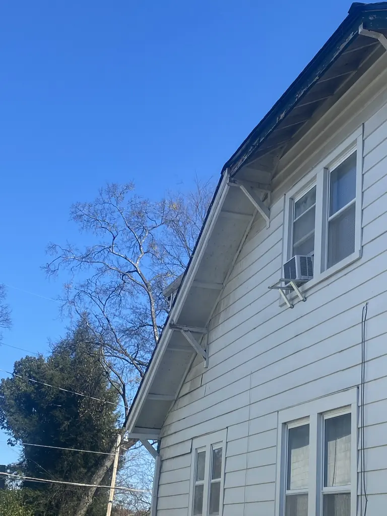 Finished white siding on a two-story home in Knoxville, Tennessee